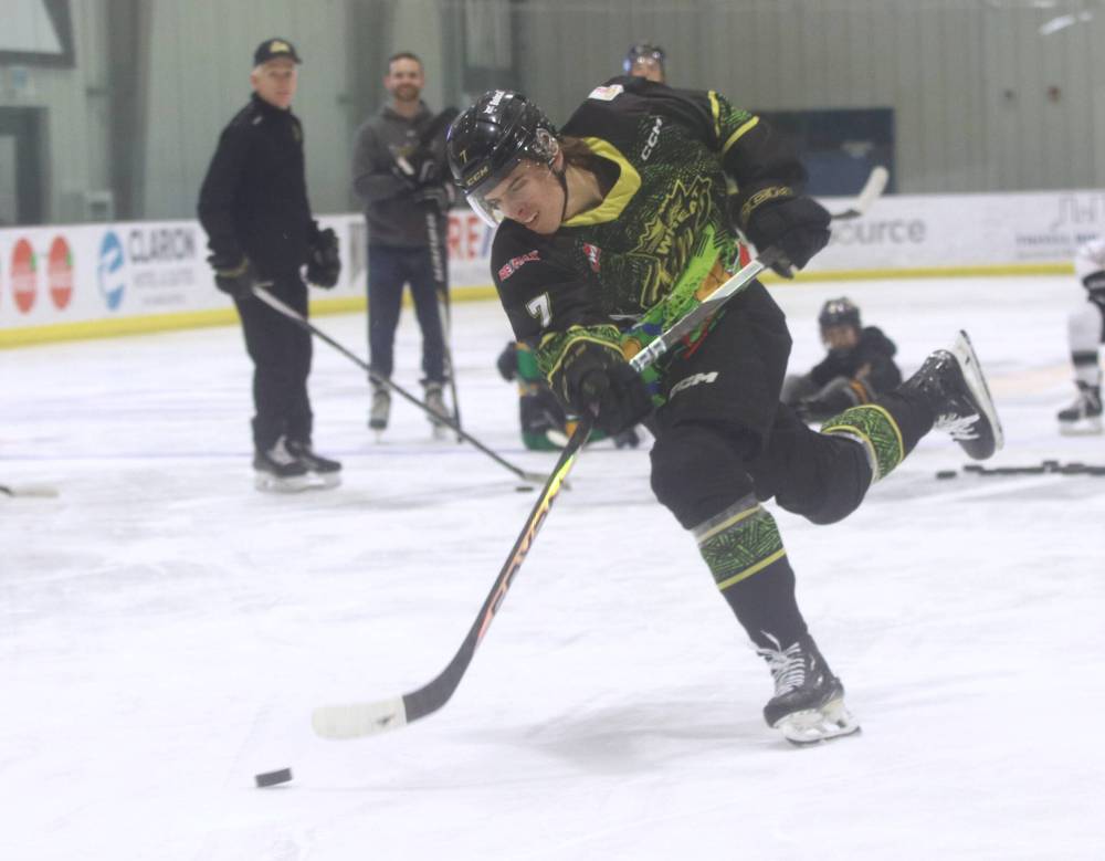 Brandon Wheat Kings defenceman Charlie Elick breaks his stick during the hardest shot competition, which was won by Quinn Mantei’s blast of 77 miles per hour. In the other events, Dominik Petr won the long shot challenge and Andrei Maliavan took the accuracy event by hitting all four targets in just five shots, which took eight seconds. Finally, defenceman Jacob DeSouza was voted the winner of the breakaway challenge. (Perry Bergson/The Brandon Sun)