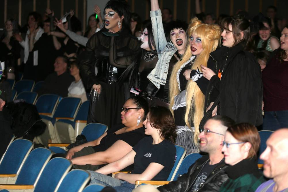 Westman movie-goers dance along to the Time Warp during Brandon Pride's screening of