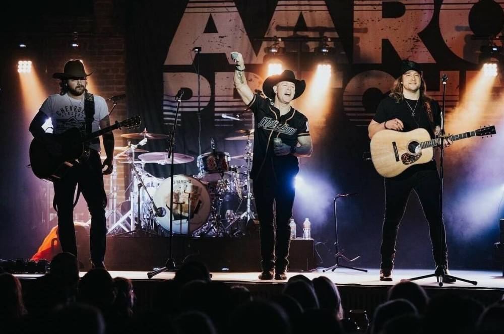 Canadian country star Aaron Pritchett (middle) shares the stage with fellow country singers Matt Lang (left) and Cory Marks on their 32-city