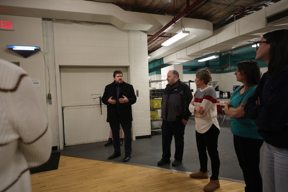Brandon East MLA Glen Simard and other politicians visited the Helping Hands Centre on Friday afternoon. (Geena Mortfield/The Brandon Sun)