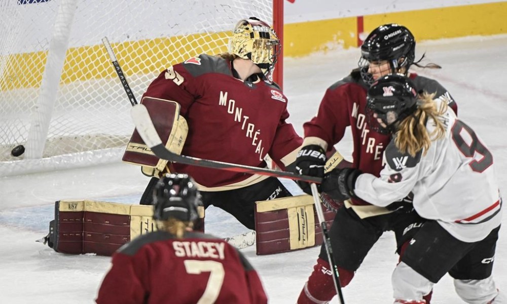 Ottawa's Daryl Watts (9) scores against Montreal goaltender Ann-Renee Desbiens during second period PWHL hockey action in Laval, Que., Sunday, March 10, 2024. THE CANADIAN PRESS/Graham Hughes