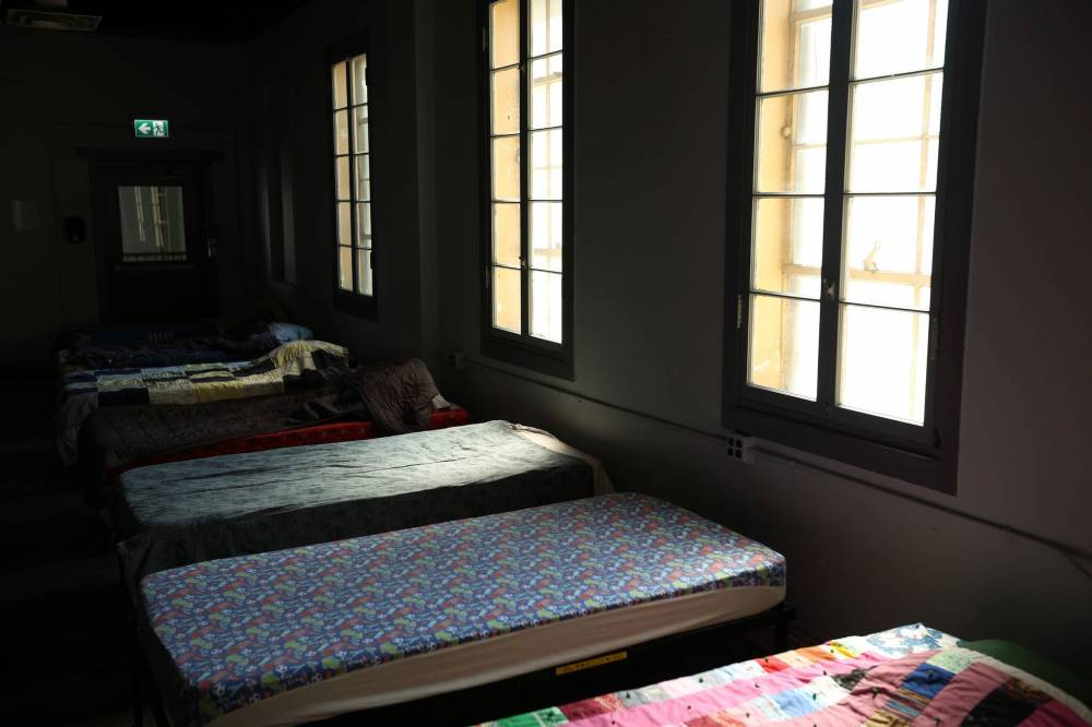 Beds are shown at the Samaritan House Ministries Safe and Warm Shelter in Brandon. Failing to provide adequate supports for offenders upon their release from jail, including housing, will simply perpetuate reoffending. (File)