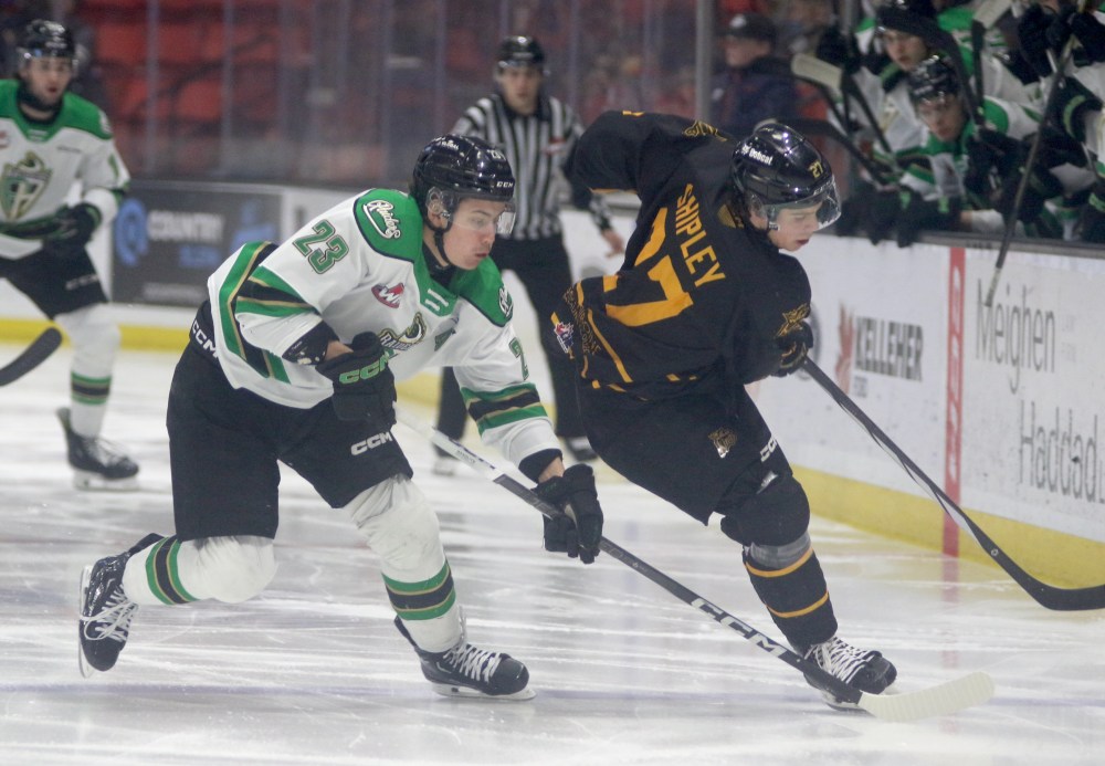 Prince Albert Raiders forward Sloan Stanick of Rapid City and Brandon Wheat Kings defenceman Luke Shipley battle for the puck on March 1 at Westoba Place. Stanick made 11 regular season visits to Brandon during his career. (Thomas Friesen/The Brandon Sun)