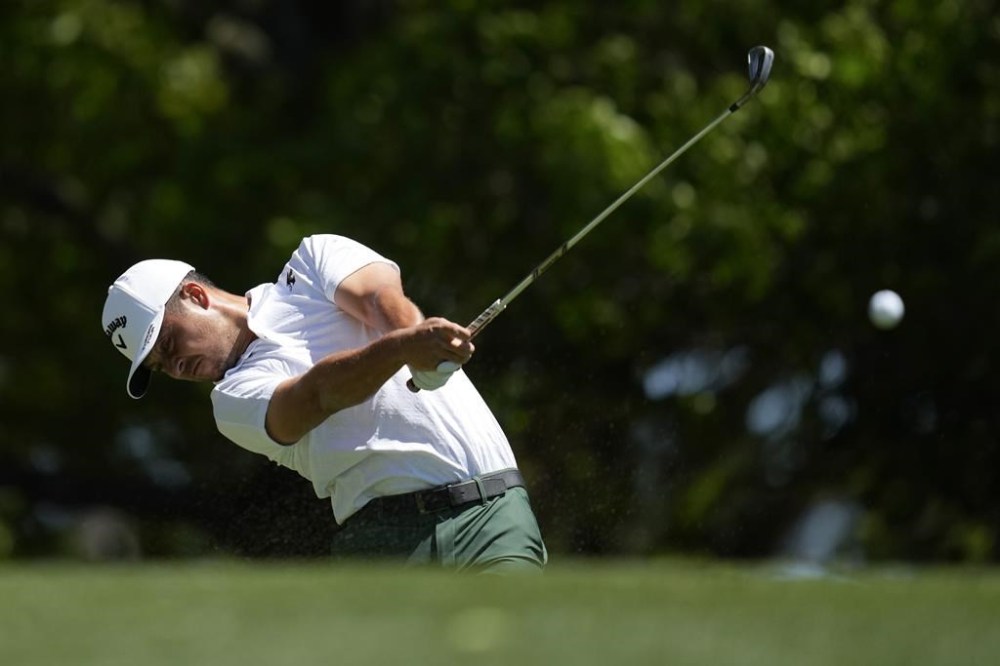 Xander Schauffele hits his tee shot on the fourth hole during third round at the Masters golf tournament at Augusta National Golf Club Saturday, April 13, 2024, in Augusta, Ga. (AP Photo/Ashley Landis)