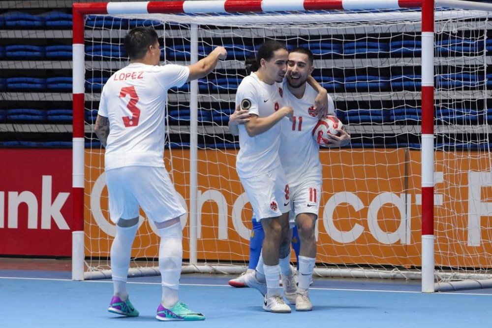 Canadians Sebastian Lopez, Aylan Khenoussi, Daniel Chamale (left to right) celebrate a goal in Canada’s 6-3 win over Nicaragua on Monday, April 15, 2024 in group play at the CONCACAF Futsal Championship in Managua, Nicaragua. Canada plays defending CONCACAF champion Costa Rica in Wednesday’s quarterfinal with a berth in the FIFA Futsal World Cup going to the winner. THE CANADIAN PRESS/HO-Canada Soccer-Victor Straffon **MANDATORY CREDIT**