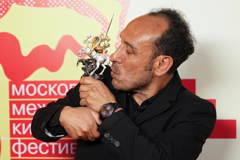 Mexican director Miguel Salgado poses with his the Golden Saint George trophy for a photo after the closing ceremony of the 46th Moscow International Film Festival in Moscow, Russia, on Friday, April 26, 2024. A Mexican film has won the top prize at the Moscow International Film Festival which took place as major Western studios boycott the Russian market and as Russia's war in Ukraine grinds into its third year.