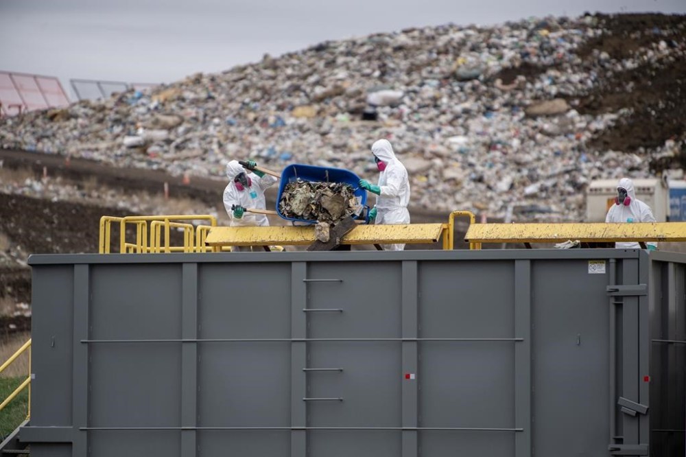 Investigators sort through contents recovered from the Saskatoon landfill in Saskatoon on Wednesday, May 1, 2024. THE CANADIAN PRESS/Liam Richards
