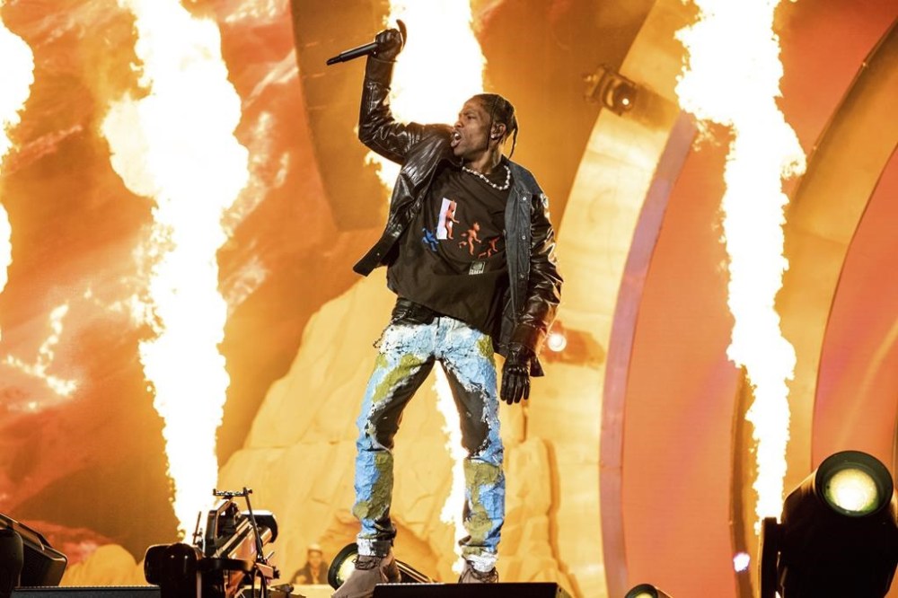 FILE - Travis Scott performs at the Astroworld Music Festival in Houston, Nov. 5, 2021. The first civil trial related to the hundreds of lawsuits filed over the deadly 2021 Astroworld festival headlined by rap superstar Scott is set to begin. Jury selection in the trial over the lawsuit filed by the family of Madison Dubiski, one of the 10 people killed at the concert in Houston, was scheduled to start on Tuesday, May 7, 2024, in Houston. (Photo by Amy Harris/Invision/AP, File)