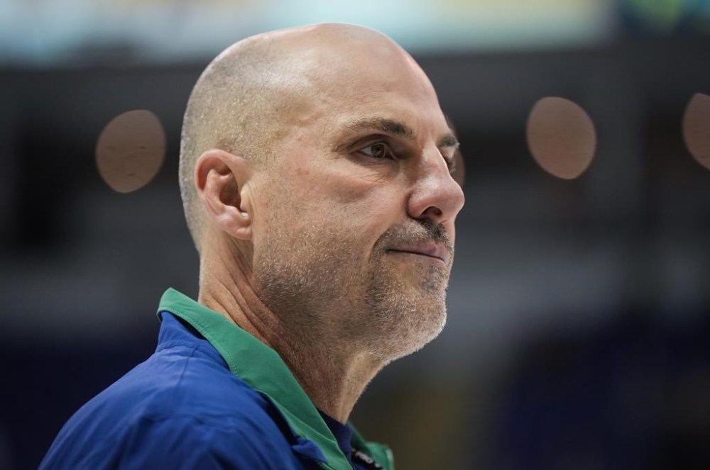 Vancouver Canucks head coach Rick Tocchet watches the opening day of the NHL hockey team's training camp, in Victoria, Thursday, Sept. 21, 2023. THE CANADIAN PRESS/Darryl Dyck