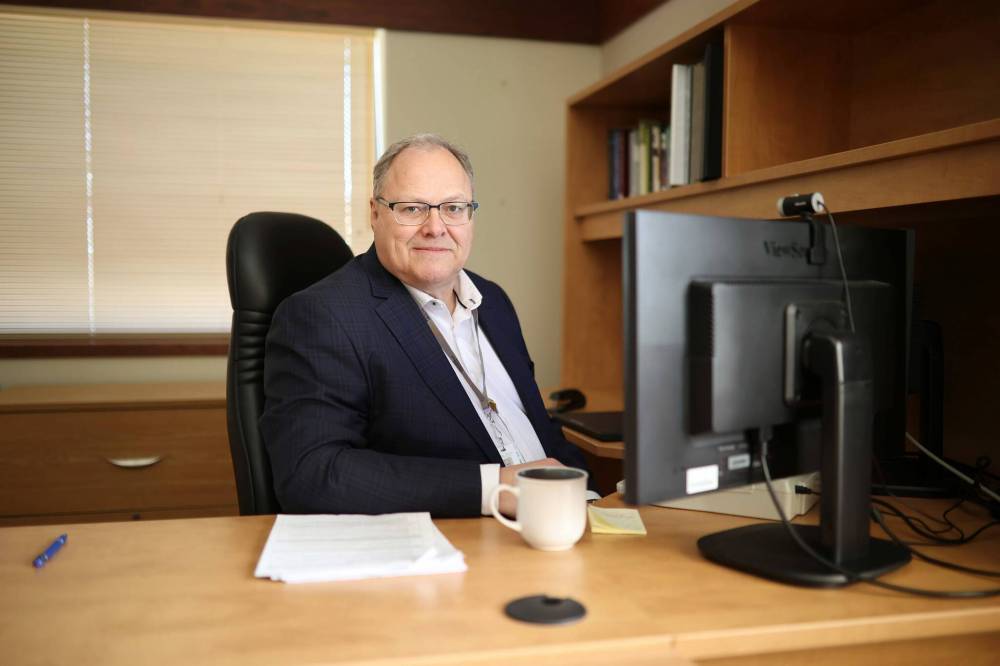 Brian Schoonbaert, CEO for Prairie Mountain Health, sits in his office Thursday on his last day of work prior to his retirement. (Tim Smith/The Brandon Sun)