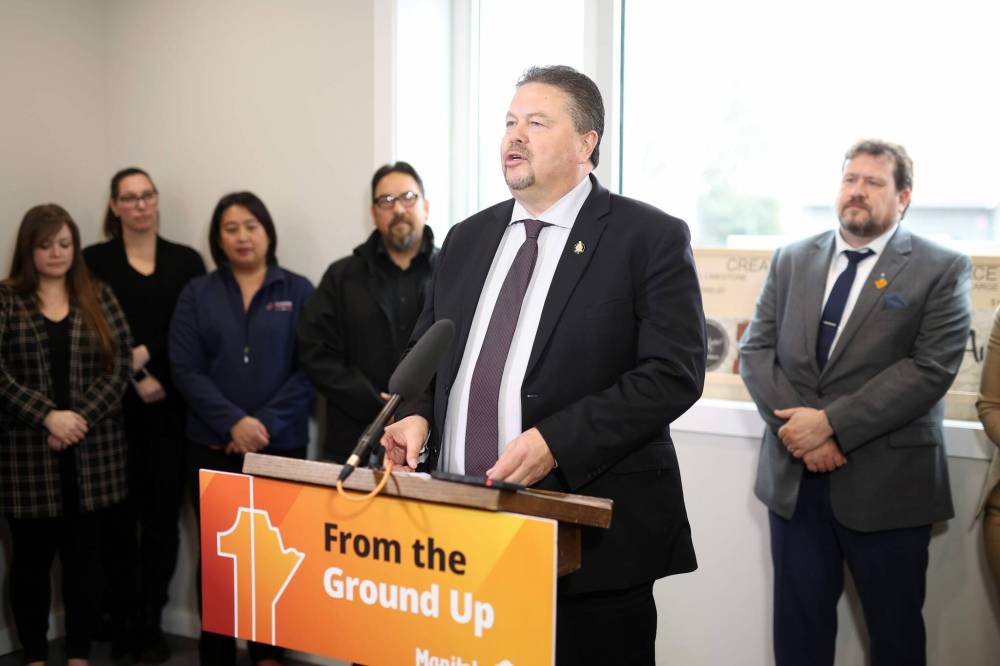 Provincial Municipal and Northern Relations Minister Ian Bushie announces a new community development program at the Brandon Neighbourhood Renewal Corporation on Monday. (Tim Smith/The Brandon Sun)