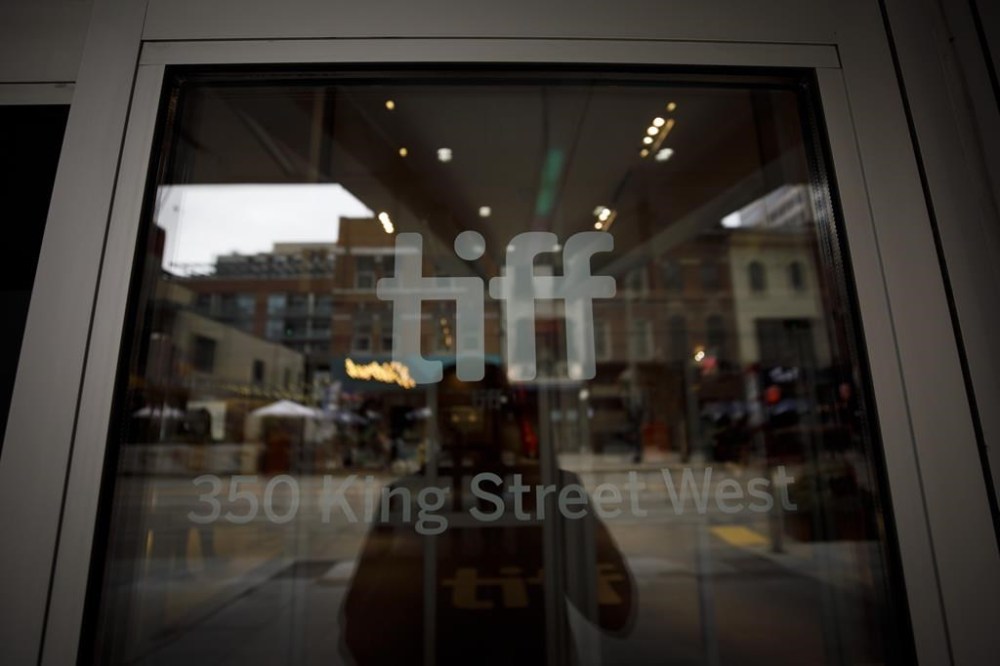 The Toronto International Film Festival says a planned content market for screen-based wheelers-and-dealers will launch at its 2026 edition. Signage is picture at Toronto International Film Festival's TIFF Bell Lightbox theatre on King St., in Toronto, ahead of the festival's opening night, Thursday, Sept. 10, 2020. THE CANADIAN PRESS/Cole Burston