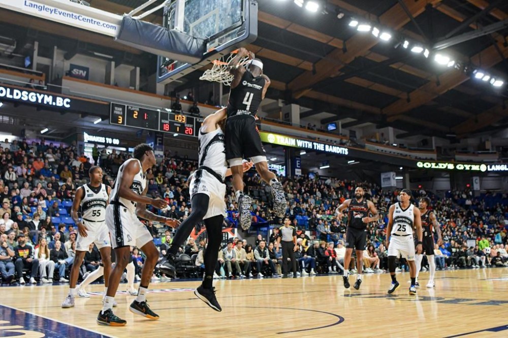 Vancouver Bandits' Taze Moore (4) scores over a Scarborough Shooting Stars player during Canadian Elite Basketball League action in Langley, B.C. on Sunday May 26, 2024. Despite jumping out to fast start and 49-44 halftime lead, the Scarborough Shooting Stars couldn't match the Vancouver Bandits, who posted an 88-83 victory in front of 5,000 fans at the LEC, located about 50 kilometres east of Vancouver. THE CANADIAN PRESS/HO-Canadian Elite Basketball League**MANDATORY CREDIT**