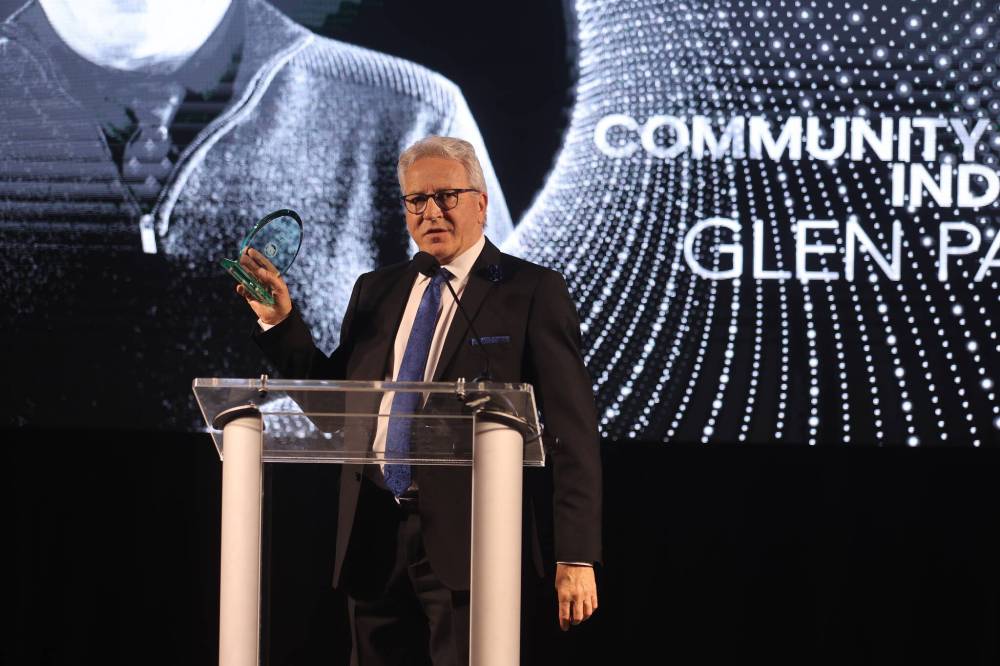 Brandon Deputy Mayor Glen Parker with his Community Impact Award — Individual. The award recognized Parker’s dedication to community service, rooted in his upbringing and personal experiences, which has left a lasting imprint on the city.