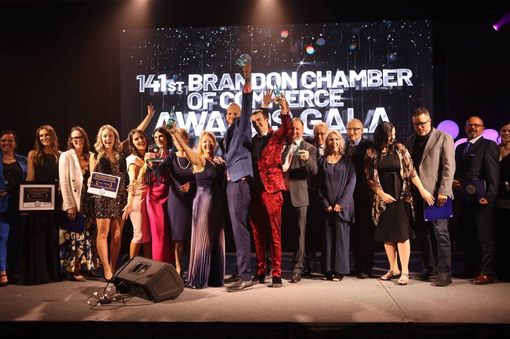 The Brandon Chamber of Commerce’s 2024 Business Achievement Awards recipients take to the stage in the Manitoba Room at the Keystone Centre on Thursday night. (Photos by Abiola Odutola/The Brandon Sun)