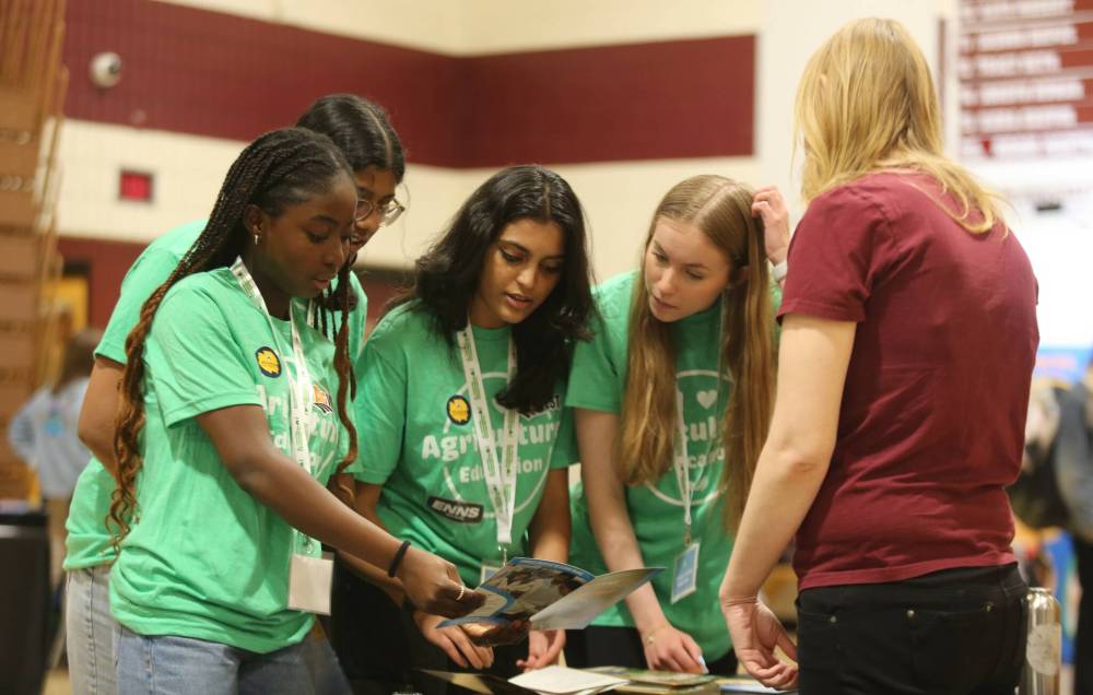 Students from Crocus Plains Regional Secondary School take part in a career fair hosted by Agriculture in the Classroom-Manitoba in the school’s gymnasium on Friday. The career fair was designed to let students know about the diverse career opportunities available in the agriculture and supporting food industries. From left: Ayomide Buhari (Grade 11), Nivedita Joseph (Grade 10), Maitri Patel (Grade 11) and Inara Innes (Grade 12). (Michele McDougall/The Brandon Sun)