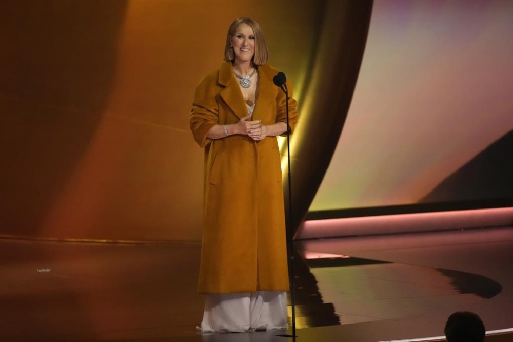 Celine Dion presents the award for album of the year during the 66th annual Grammy Awards on Sunday, Feb. 4, 2024, in Los Angeles. THE CANADIAN PRESS/AP-Chris Pizzello