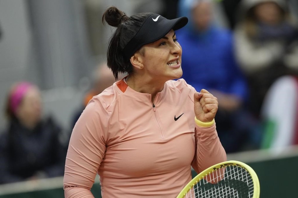 Canada's Bianca Andreescu clenches her fist after scoring a point against Italy's Jasmine Paolini during their third round match of the French Open tennis tournament at the Roland Garros stadium in Paris, Saturday, June 1, 2024. Andreescu continued her comeback from injury with a 6-4, 3-6, 7-6 (3) win over former world No. 1 Naomi Osaka of Japan in quarterfinal action Friday at the Libema Open. THE CANADIAN PRESS/AP-Thibault Camus
