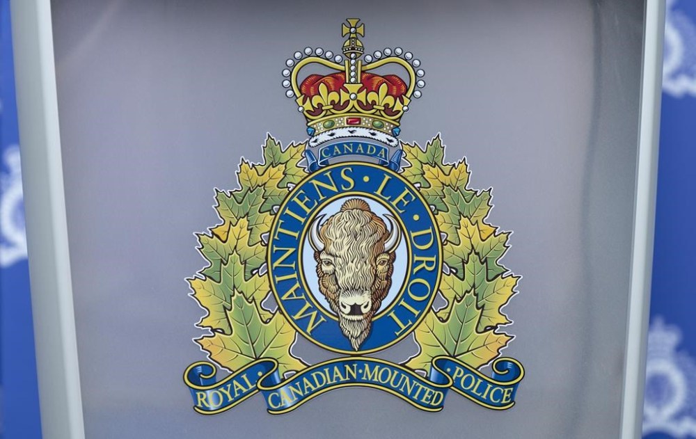 The RCMP logo is seen on a podium ahead of a news conference, in St. John's on June 24, 2023. THE CANADIAN PRESS/Adrian Wyld