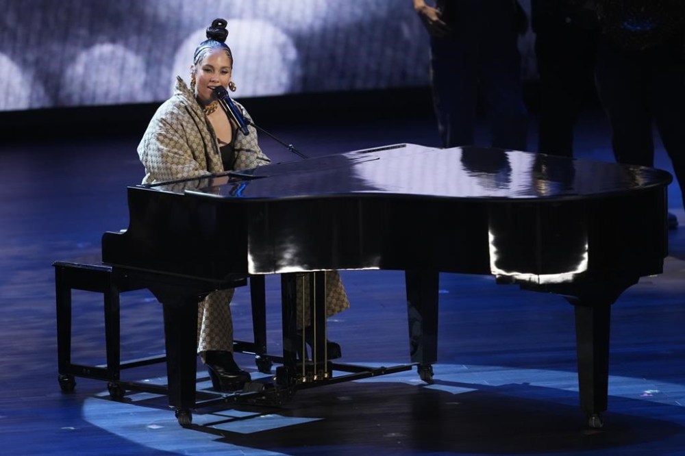 Alicia Keys performs with members of the company of