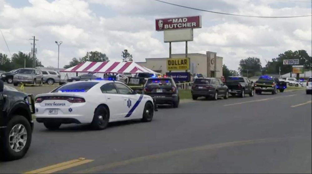 Police respond to the scene of a shooting on Friday, June 21, 2024 in Fordyce, Ark. Arkansas State Police say at least two people were killed and eight wounded in a shooting that occurred at a grocery store in south Arkansas. (KATV via AP)