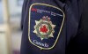 Correctional Service Canada confirms that the maximum-security Port-Cartier, Que. has been evacuated due to wilfires. Patches are seen on the arm and shoulder of a corrections officer during a media tour in Abbotsford, B.C., Thursday, Oct. 26, 2017. THE CANADIAN PRESS/Darryl Dyck