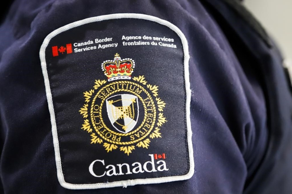 The union representing Canada’ border workers says members have voted 91 per cent in favour of a new collective agreement. A Canada Border Services Agency patch is seen on an officer in Calgary on Thursday, Aug. 1, 2019. THE CANADIAN PRESS/Jeff McIntosh