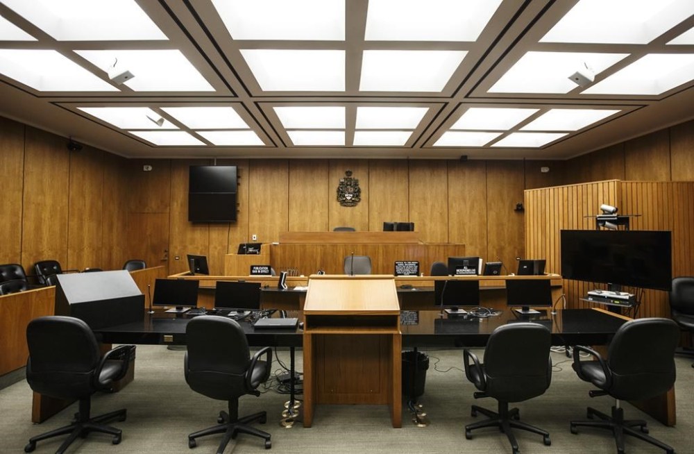A courtroom at the Edmonton Law Courts building, in Edmonton on Friday, June 28, 2019. Legal Aid Alberta says it will continue provide lawyers to those who can't afford them as negotiations resume with the province and law society over a new governance agreement. THE CANADIAN PRESS/Jason Franson