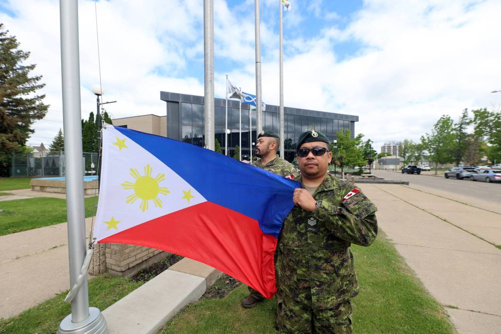 Members of 2nd Battalion, Princess Patricia's Canadian Light Infantry of Filipino descent assisted in a flag-raising ceremony for Filipino Heritage Month in front of Brandon City Hall on Tuesday. (Colin Slark/The Brandon Sun)