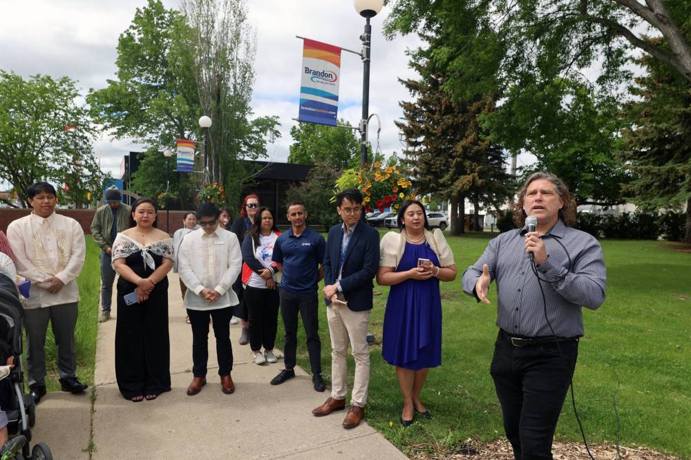 Mayor Jeff Fawcett speaks during a flag-raising event commemorating Filipino Heritage Month on Tuesday morning at Brandon City Hall. (Colin Slark/The Brandon Sun)