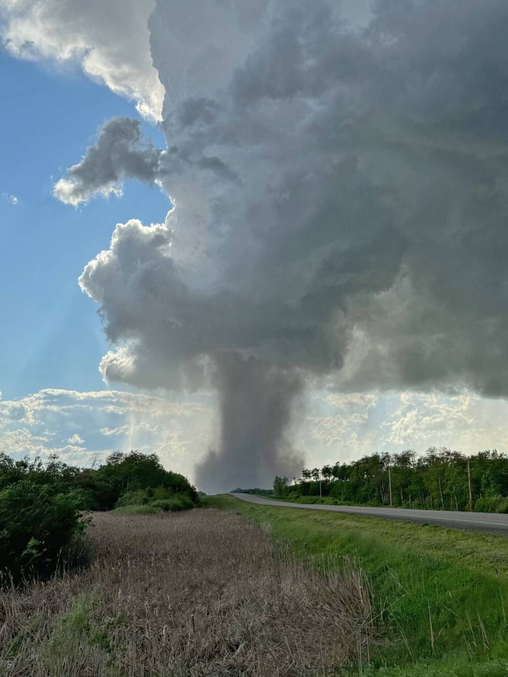 A suspected tornado touches down near Bruxelles on Wednesday evening. (Jeremy Rand)