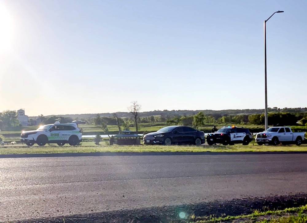 Police arrested a passenger in a taxi stopped just north of the First Street Bridge around 8:30 p.m. on Thursday in relation to a business on Middleton Avenue getting a window shot out earlier that evening. (Brandon Sun staff)