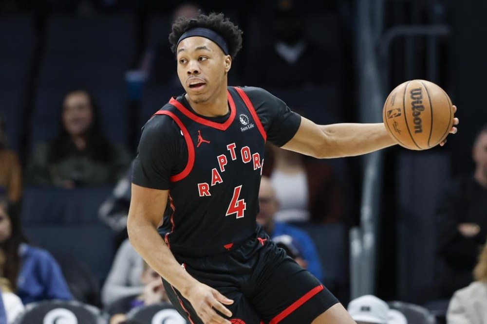 All-star forward Scottie Barnes and point guard Immanuel Quickley have both officially re-signed with the Toronto Raptors. Barnes brings the ball up court during the first half of an NBA basketball game against the Charlotte Hornets in Charlotte, N.C., Wednesday, Feb. 7, 2024. THE CANADIAN PRESS/AP - Nell Redmond