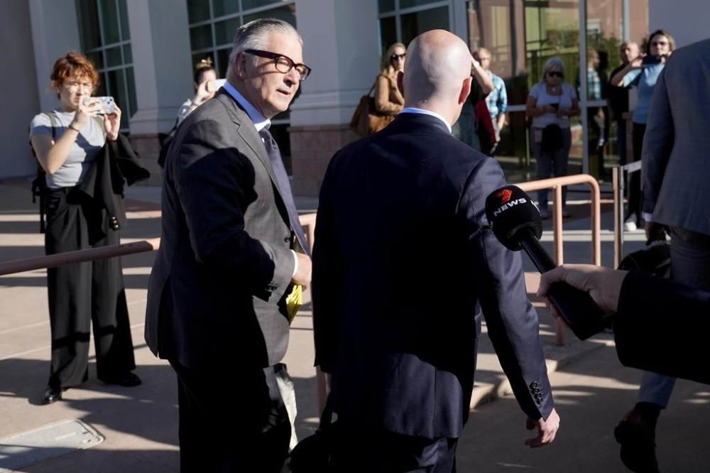 Actor Alec Baldwin, left, and attorney Luke Nikas, arrive for jury selection in his involuntary manslaughter trial, Tuesday, July 9, 2024, in Santa Fe, N.M. (AP Photo/Ross D. Franklin)