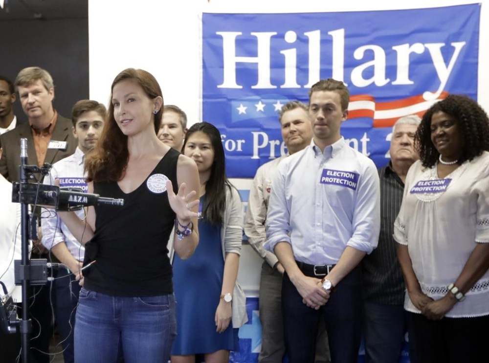 FILE - Actress Ashley Judd, front left, speaks at a news conference Nov. 7, 2016, in Nashville, Tenn. Judd is adding her voice to calls for President Joe Biden to step aside from the presidential race following his performance in last month's debate. Judd wrote in an opinion piece for USA Today on Friday, July 12, 2024, that she worries the Democrat could lose to Republican Donald Trump in November. Judd did not suggest a replacement for Biden atop the ticket. (AP Photo/Mark Humphrey, File)