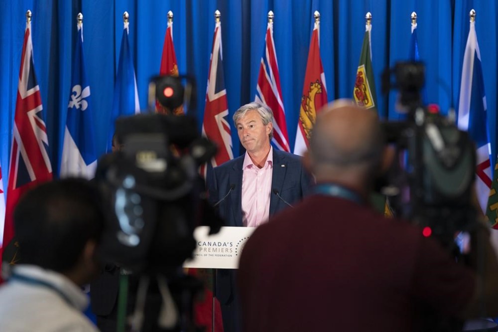 Nova Scotia Premier Tim Houston speaks to reporters during meetings with Canada's other premiers at the Council of the Federation in Halifax on Tuesday, July 16, 2024. THE CANADIAN PRESS/Darren Calabrese