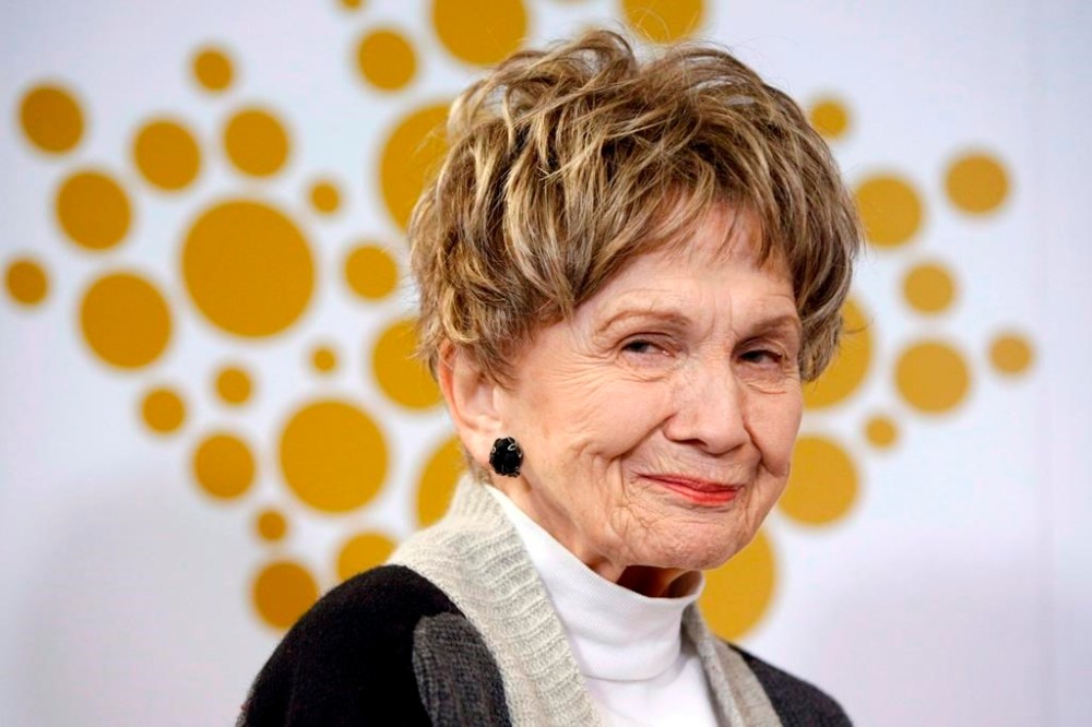 Nobel Prize-winning Canadian author Alice Munro's husband declined to address the courtroom after pleading guilty to sexually assaulting the author's daughter, but it was noted that he'd donated $10,000 to a program for abuse victims, a court transcript shows. Munro attends a Royal Canadian Mint ceremony to celebrate her win by issuing a silver five-dollar coin at the Great Victoria Public Library in Victoria, Monday, March 24, 2014. THE CANADIAN PRESS/Chad Hipolito