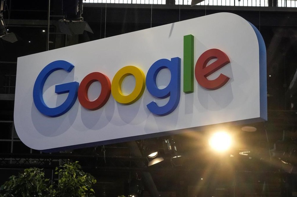 The Google logo is photographed at the Vivatech show in Paris, Thursday, June 15, 2023. Google says it will pass on the cost of the Liberal government's digital services tax to advertisers. THE CANADIAN PRESS/AP, Michel Euler