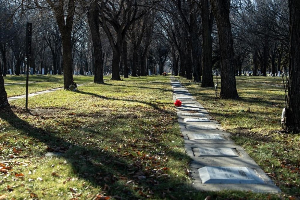 Funeral professionals across the country are warning grieving families about third-party websites republishing obituaries for monetary gain. A general view of Woodlawn Cemetery in Saskatoon is shown on Nov. 11, 2023. THE CANADIAN PRESS/Liam Richards