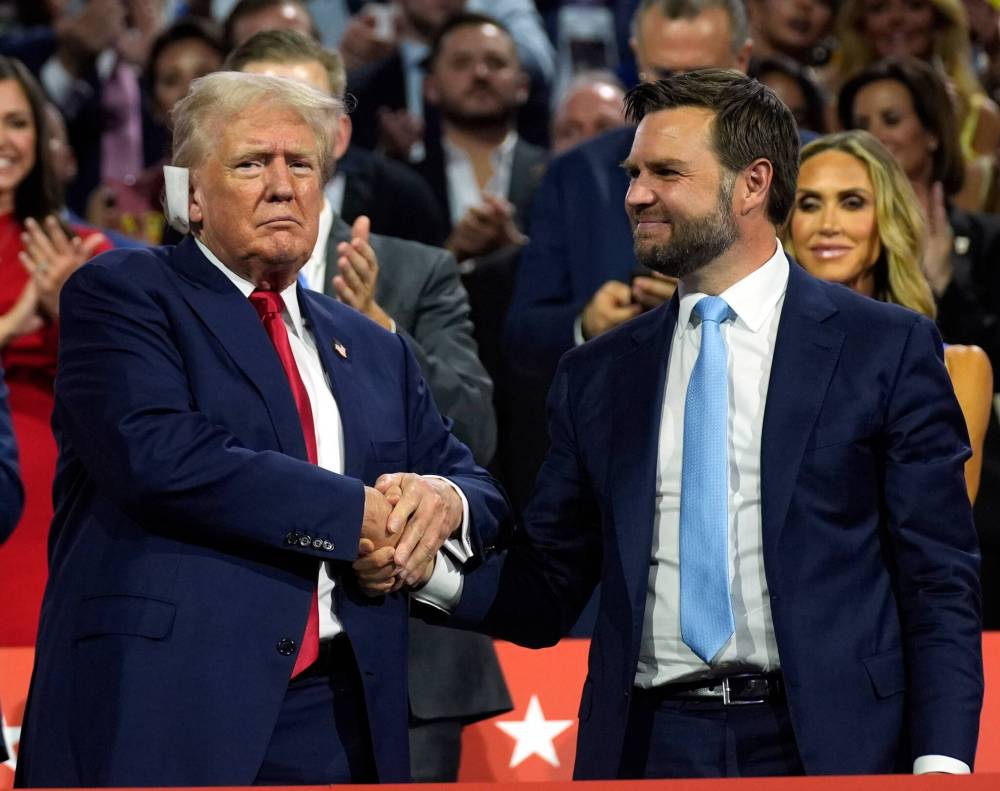 Republican presidential candidate Donald Trump and Republican vice-presidential candidate Sen. JD Vance attend the first day of the Republican National Convention in Milwaukee on Monday. (The Associated Press)