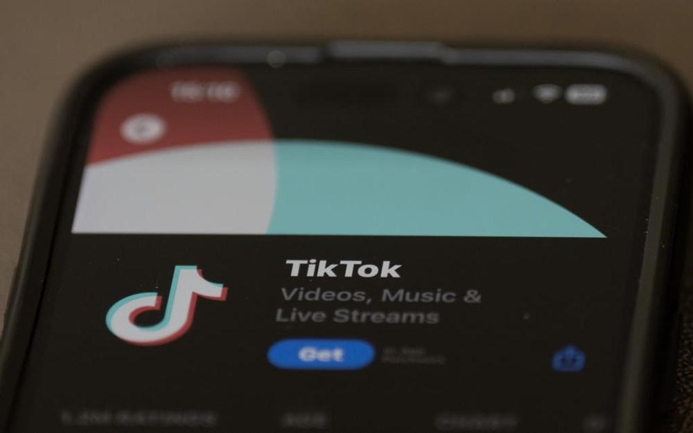 As kids head back to school, many will be logging onto TikTok to connect with classmates or bust boredom with an endless scroll of videos. The TikTok download screen is seen on the Apple Store on an iPhone, in Ottawa, Wednesday, Oct. 18, 2023. THE CANADIAN PRESS/Adrian Wyld