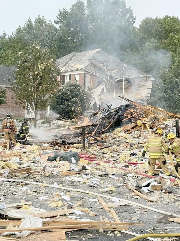 In this photo provided by Joppa Magnolia Volunteer Fire Company, debris is seen in a street after an apparent house explosion in Harford County, Maryland, Sunday, Aug. 11, 2024. Fire officials say at least one person has died after an apparent explosion leveled a house in a town northeast of Baltimore. (Joppa Magnolia Volunteer Fire Company via AP)