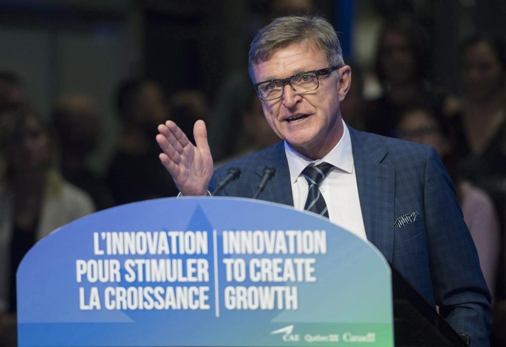 CAE President and CEO Marc Parent speaks during an investment announcement at CAE in Montreal, Wednesday, August 8, 2018. THE CANADIAN PRESS/Graham Hughes