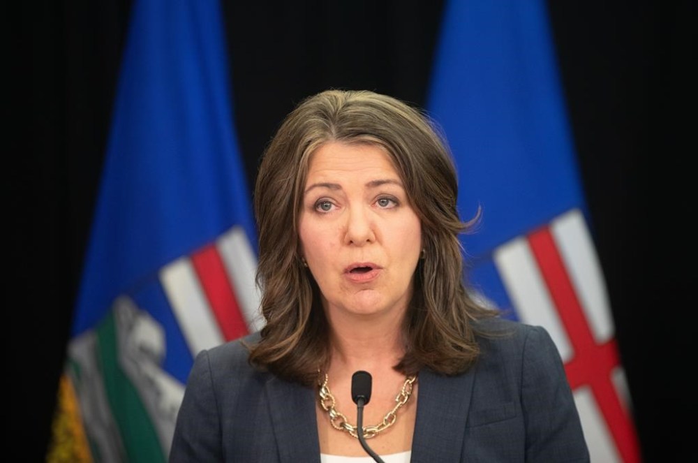 Alberta Premier Danielle Smith introduces legislation addressing agreements between the federal government and provincial entities in Edmonton on Wednesday April 10, 2024. Alberta's doctors and nurses say they have questions and concerns about the government's plan to offload underperforming hospitals from Alberta Health Services to third party operators, and they want to see the details.THE CANADIAN PRESS/Jason Franson.