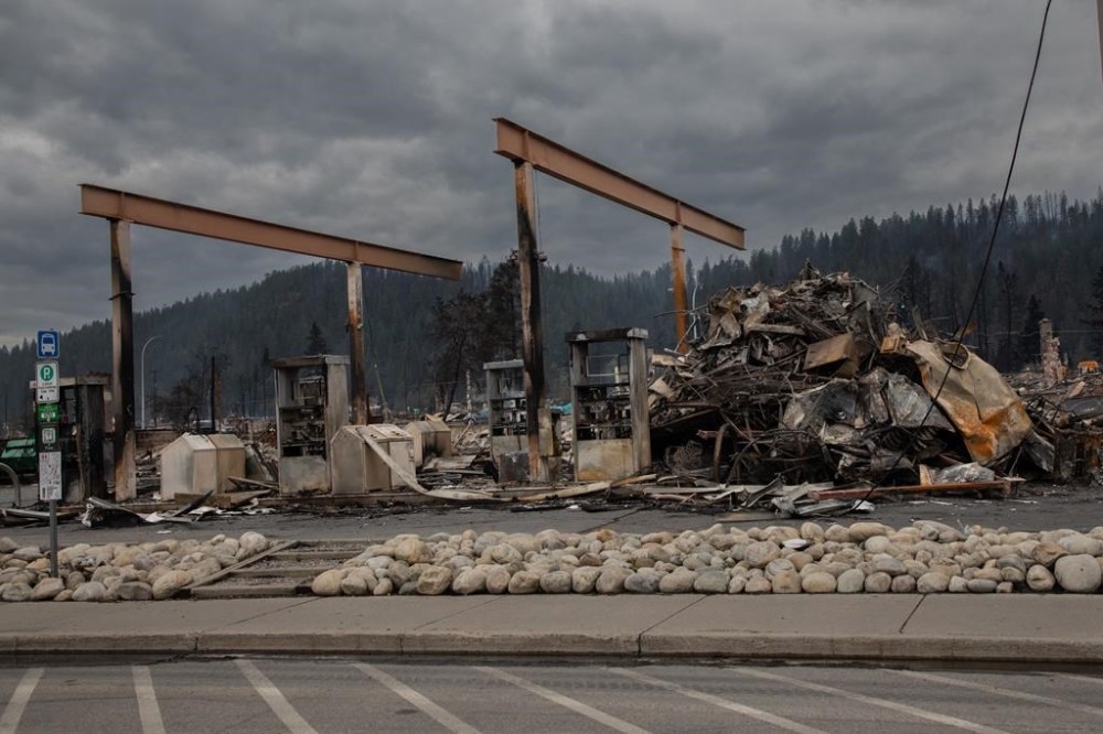 An internal government memo reveals budget and staff challenges have exhausted employees and sapped morale at the federal nerve centre for managing forest fires and other emergencies.The burned-out Esso gas station in Jasper, Alta. is shown on Friday July 26, 2024. THE CANADIAN PRESS/Amber Bracken