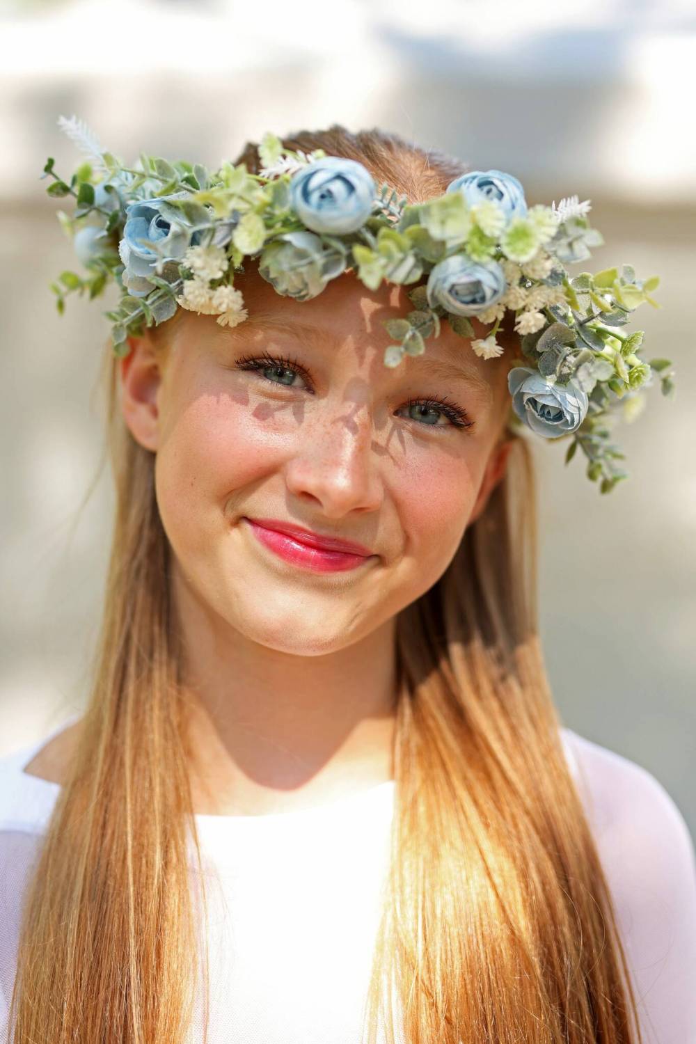 Lena Gabrush with the Rushnychok Ukrainian Folk Dance Association smiles after dancing in the lyrical solo female 13-15 years old category of the talent competition on Friday.