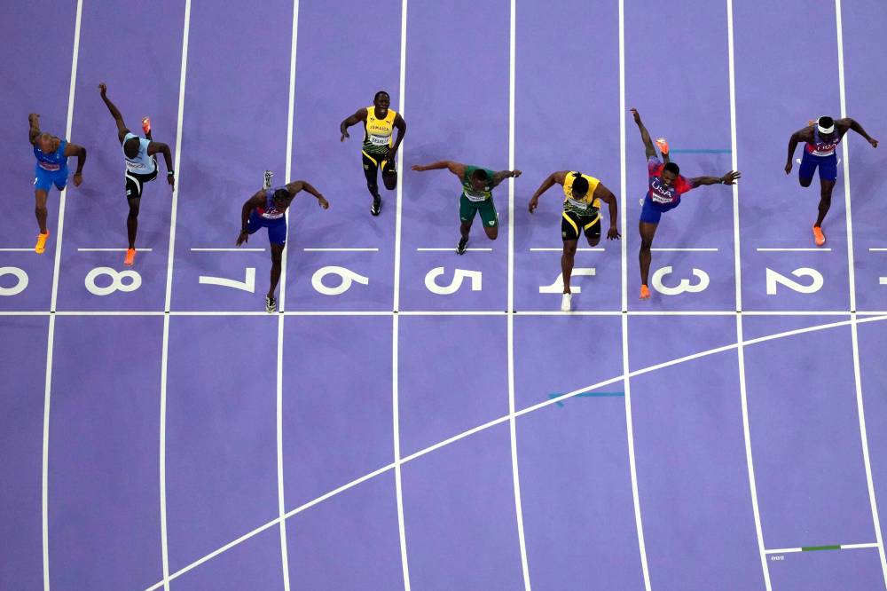 Noah Lyles, of the United States, in lane seven, wins the men’s 100-metre final at the 2024 Summer Olympics, on Aug. 4, in Saint-Denis, France. Photo-finish technology determined that Lyles won the gold medal by 0.005 of a second, but is that technology really accurate? (The Associated Press)