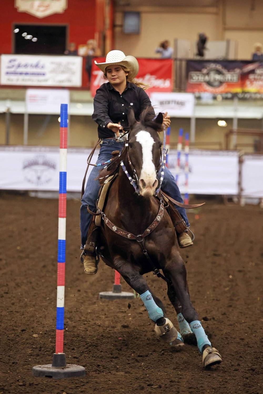 Sadie Brown of Virden competes in the pole bending event.