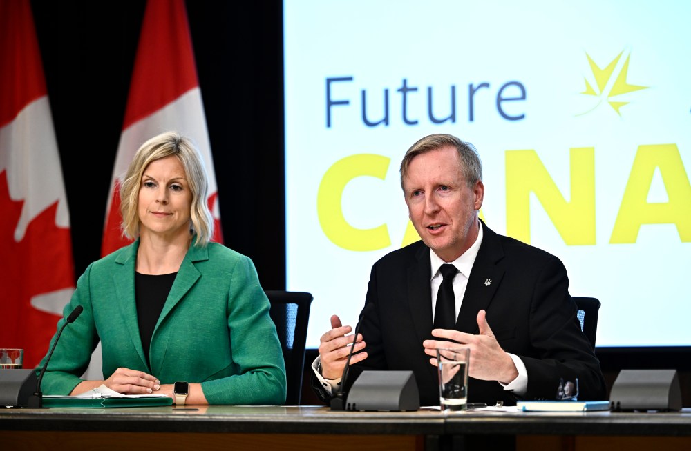 Dominic Cardy (right), the interim leader of the Canadian Future Party, and interim party president Tara McPhail speak at a news conference launching their new federal party at the National Press Theatre in Ottawa on Wednesday. (The Canadian Press)