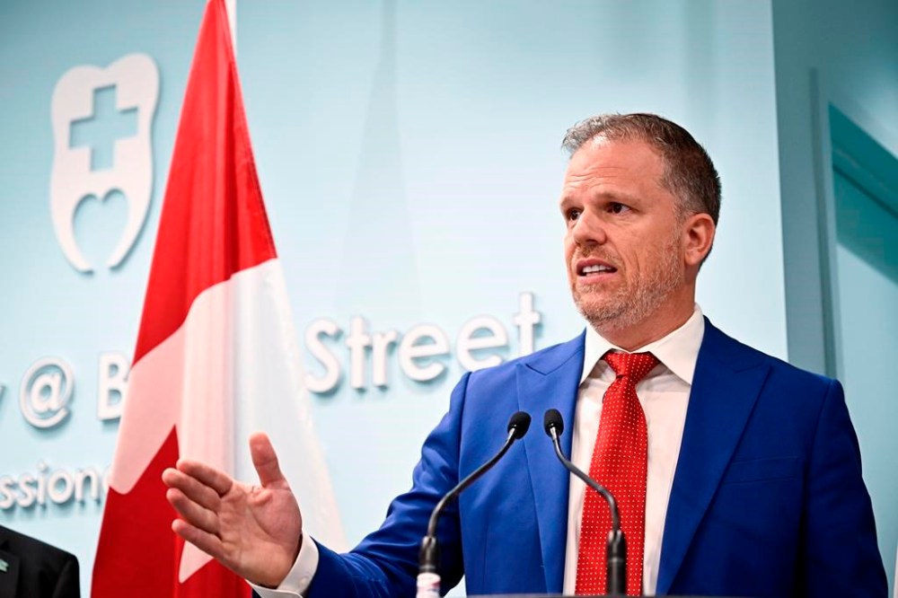 Health Minister Mark Holland says more than four-fifths of dental providers are now participating in his government's dental-care program, and some 600,000 Canadians have taken advantage of it. Holland makes an announcement on the Canadian Dental Care Plan at a dental office in Ottawa, Wednesday, Aug. 7, 2024. THE CANADIAN PRESS/Justin Tang